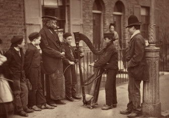 Italian street musicians in London, by John Thomson, 1877. J. Paul Getty Museum. Public Domain.