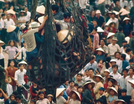 Refugees from Hue arrive on a cargo ship at Da Nang, March 1975. MarkGodfrey/TopFoto.