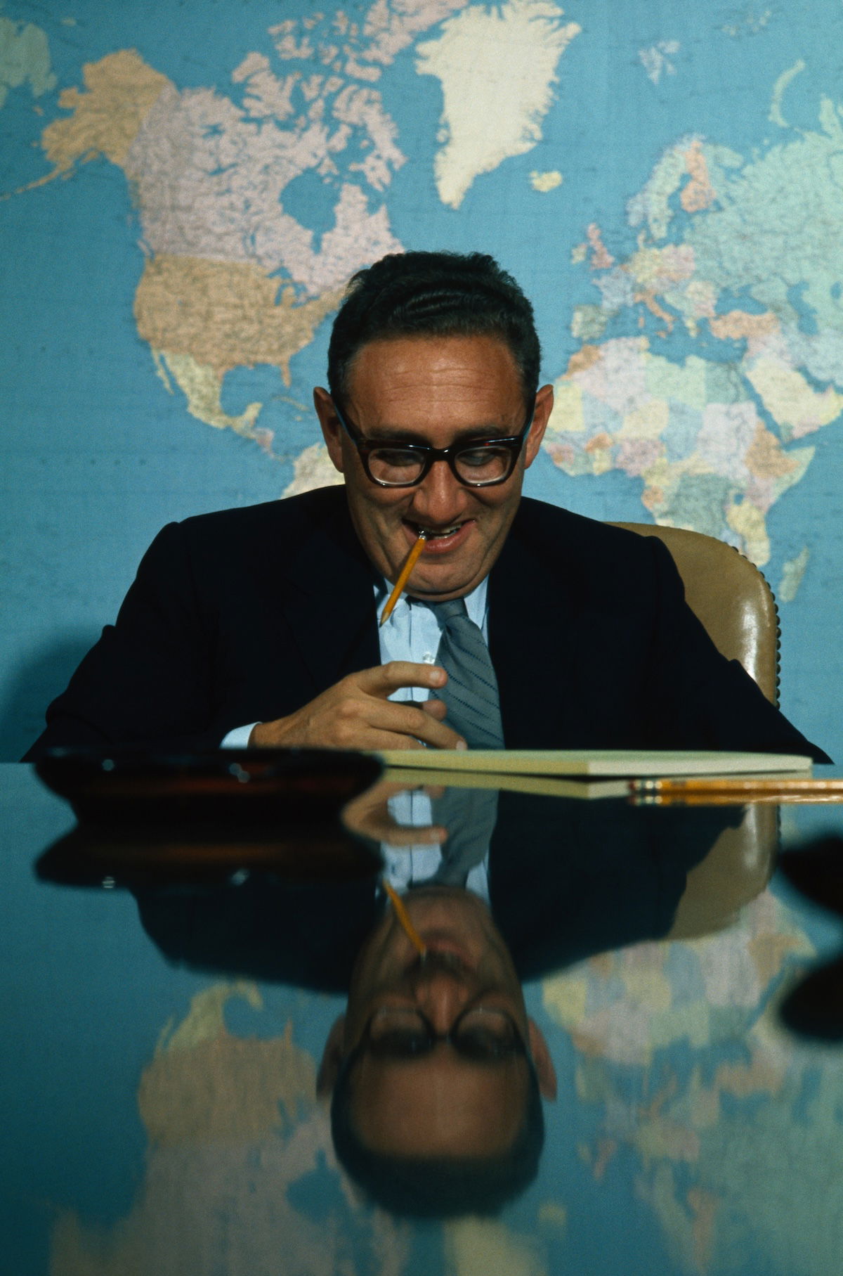 Henry Kissinger poses for a portrait in the Situation Room in the basement of the West Wing at the White House, Washington, DC, 1969. Photo © Wally McNamee/CORBIS/Getty Images.