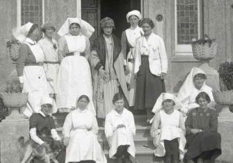 Photograph of the matron and staff of the Lady Chichester Hospital for the Treatment of Early Mental Disorders, Hove, 1921. East Sussex Record Office.